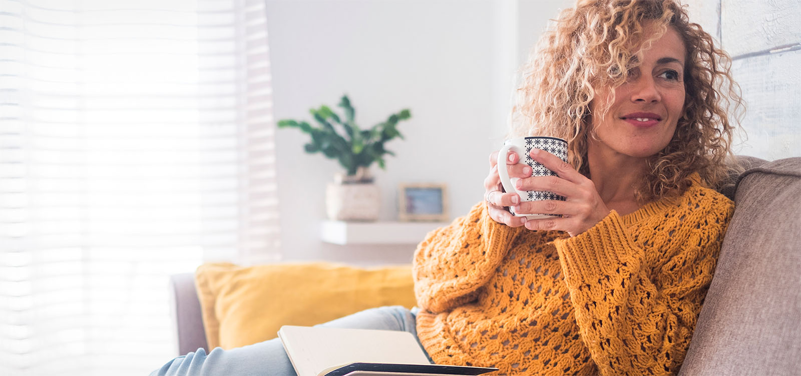 Woman sitting on couch